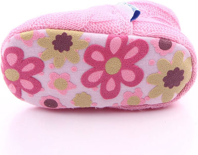 Roze gebreide babyslofjes