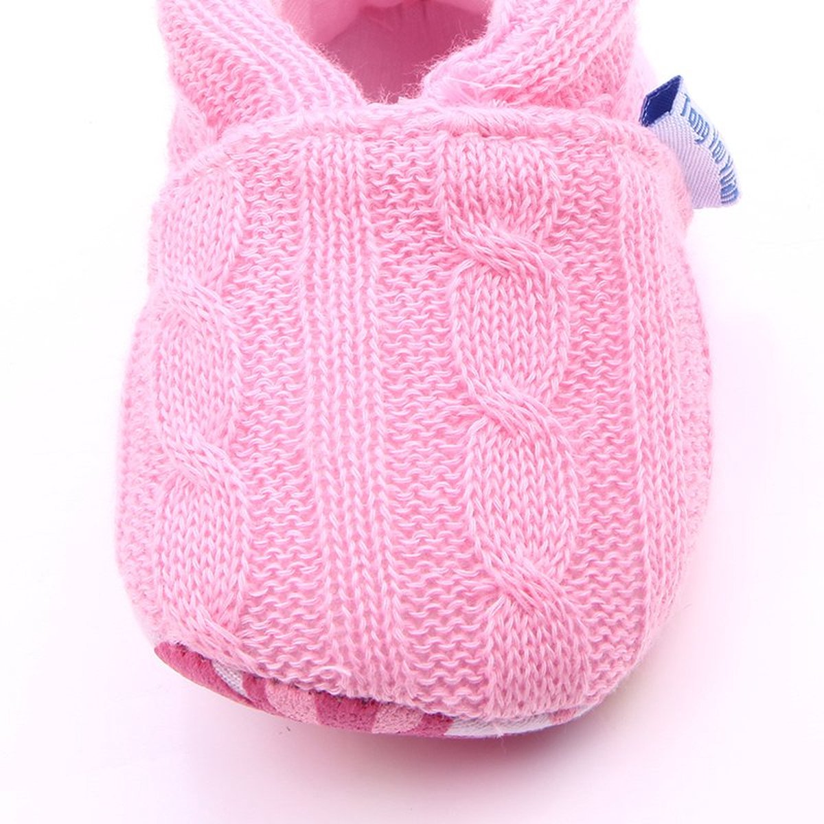 Roze gebreide babyslofjes