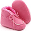 Roze babylaarsjes met sierstiksel